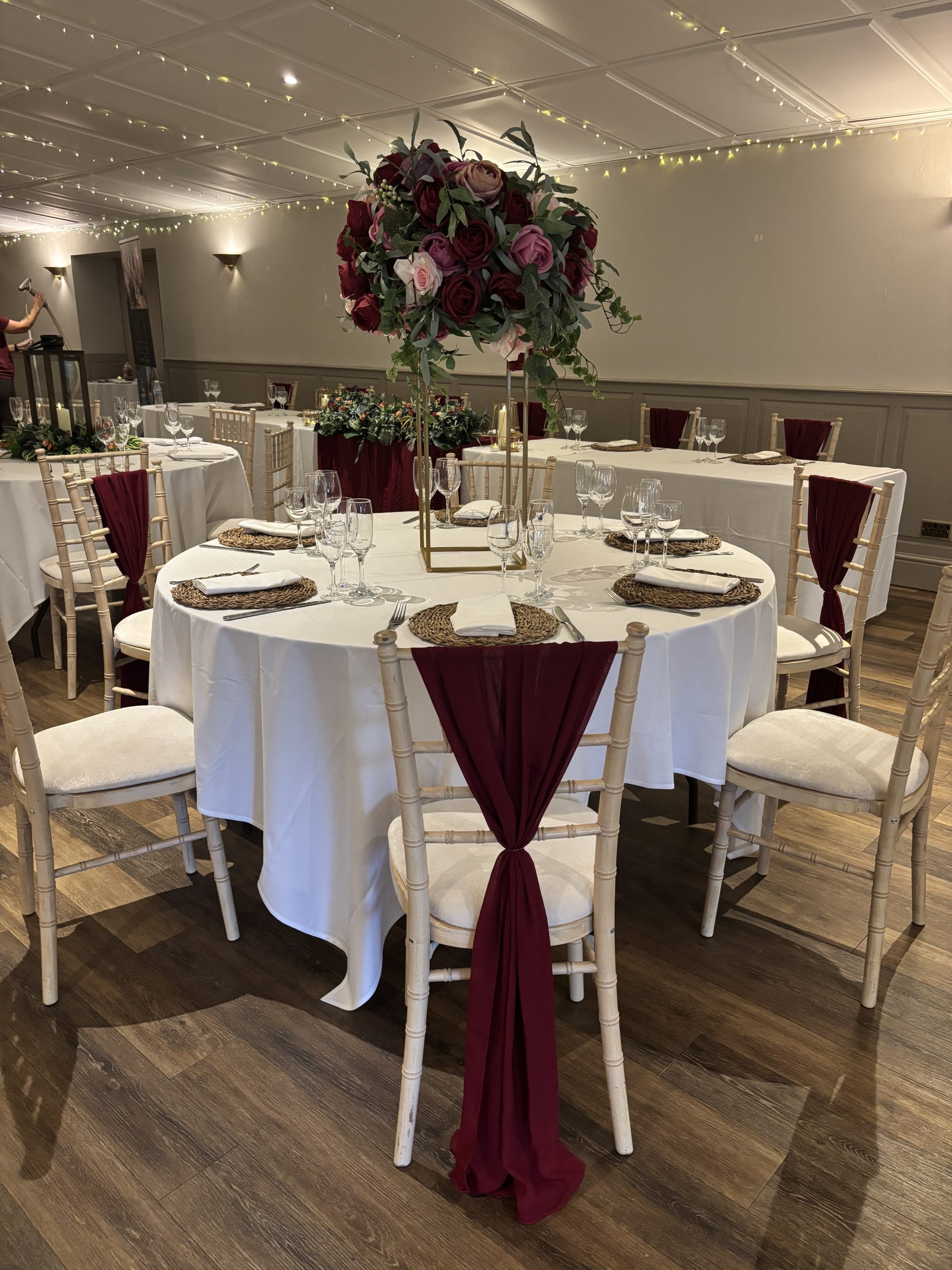 IMG_6409 Burgundy chiffon chair sash and luxury floral centrepiece