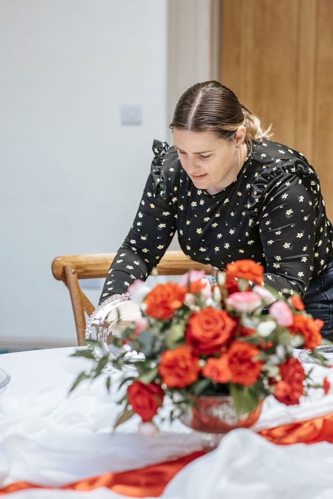 kara setting up the table