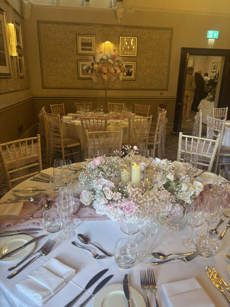 low floral silk centrepiece and candles