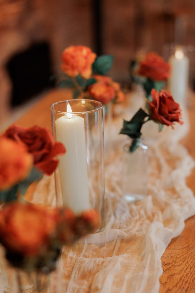candles and silk bud vases