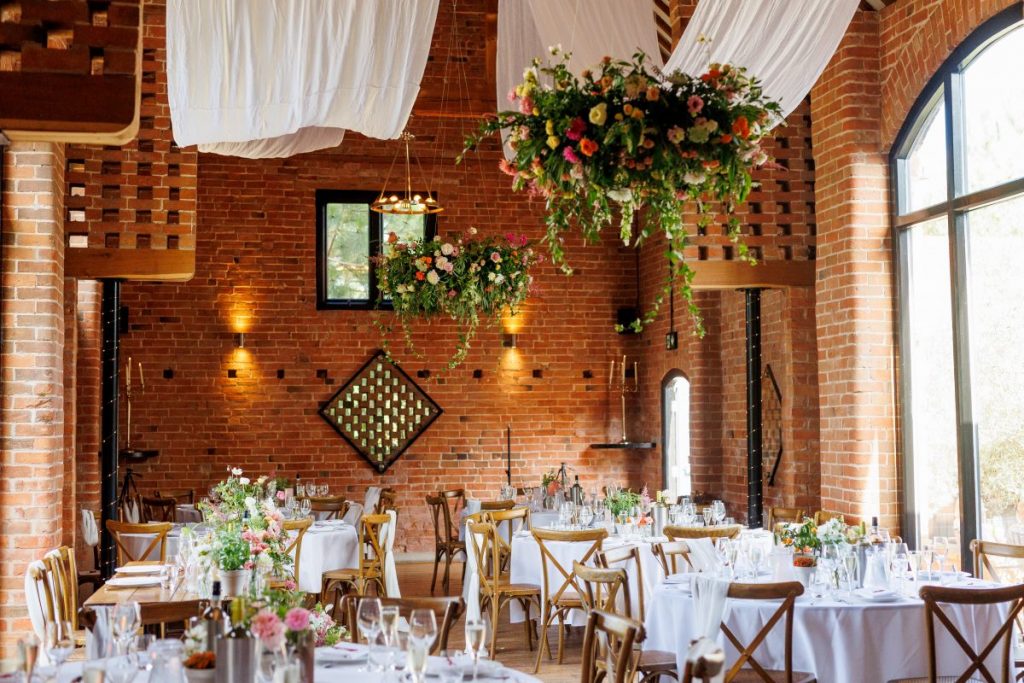 ceiling draping and floral hoops
