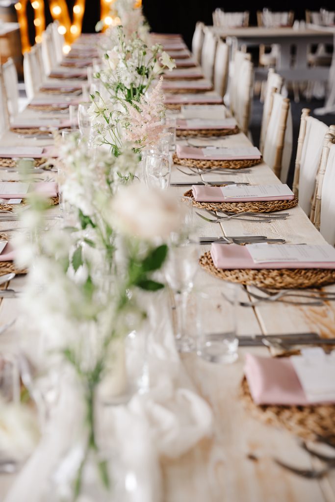 fresh flowers napkins and charger plates