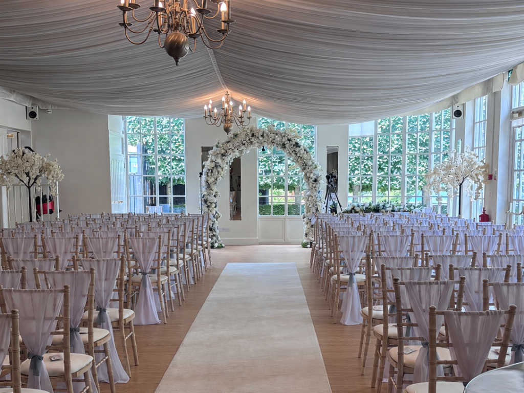 Warwick house ceremony with deluxe arch