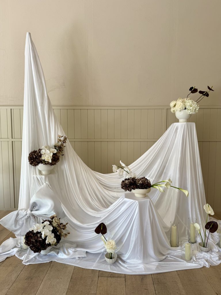 ceremony draping and fresh flowers
