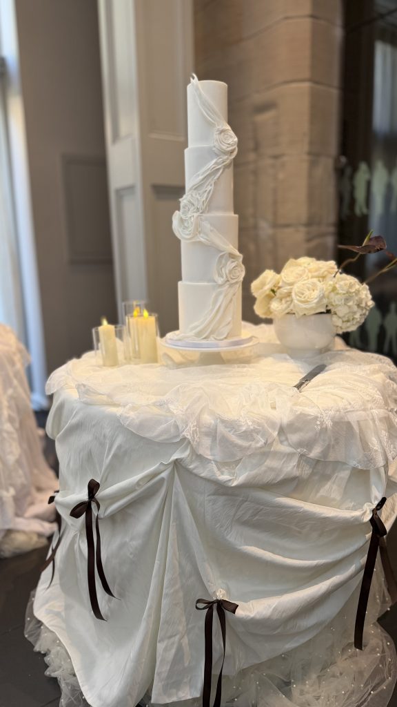 cake table fabric installation taffeta bows